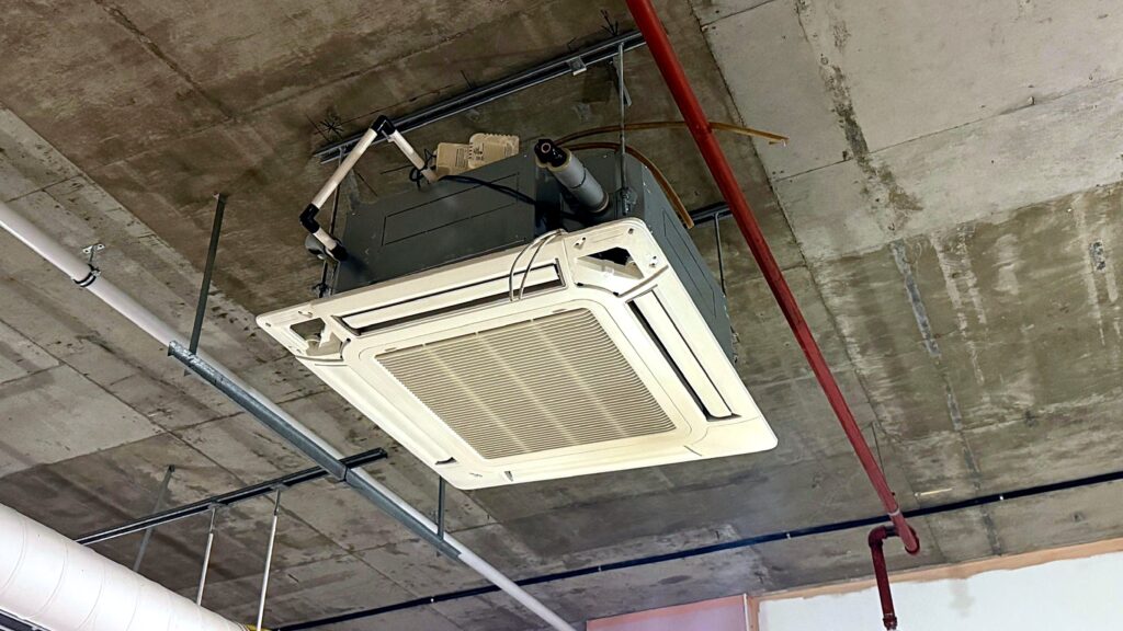 Ceiling cassette air conditioning unit installed