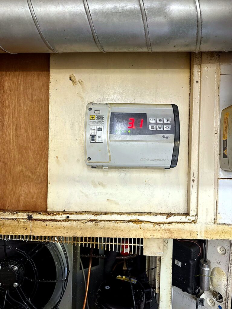 Digital refrigeration controller above a condensing unit