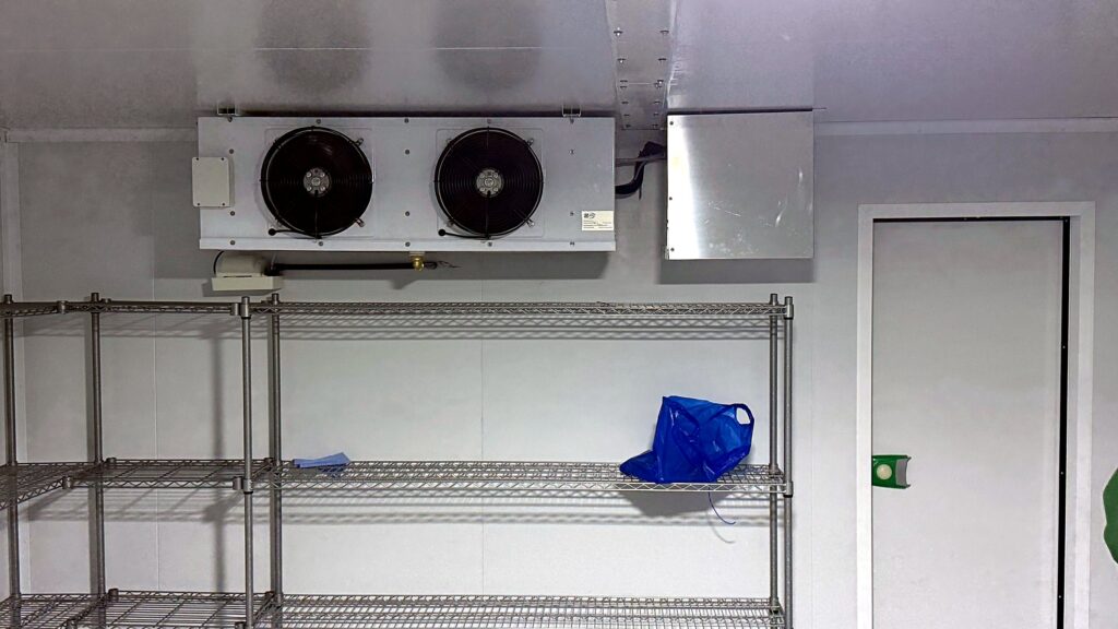 Finished cold room with evaporator and stainless shelving