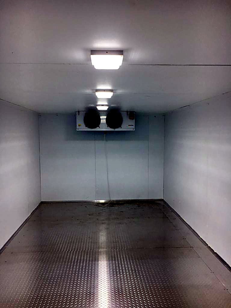Finished cold room with chequer plate floor and evaporator