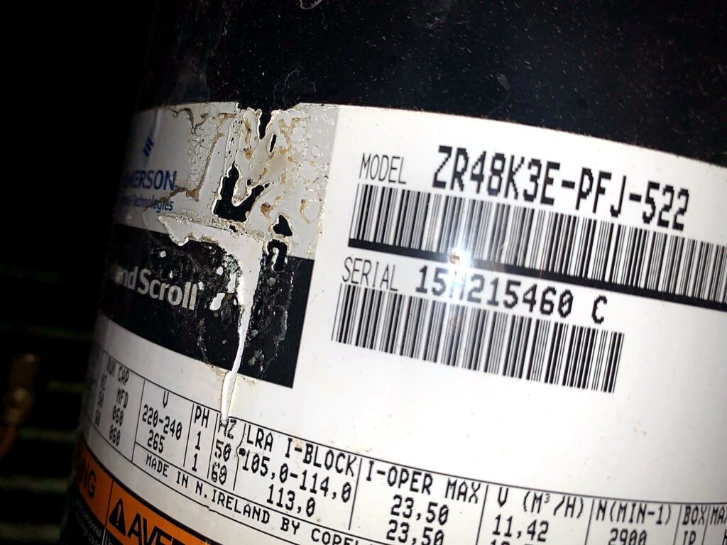 Scroll compressor label checked during repair