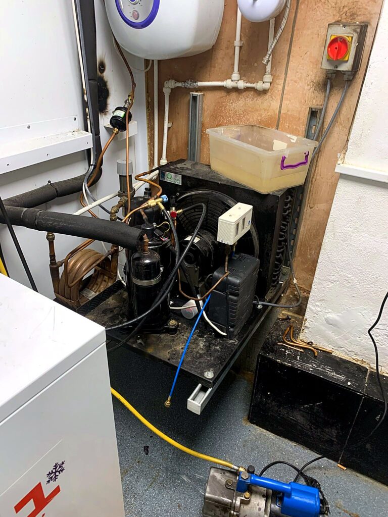 Condensing unit pipework and electrical connections