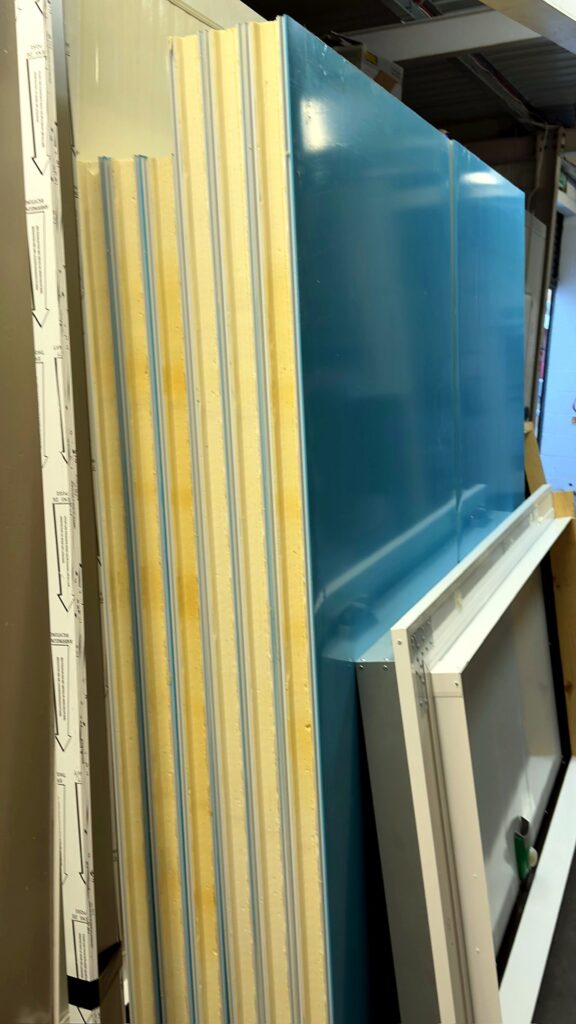 Insulated cold room panels and door ready in the UK Coldroom workshop