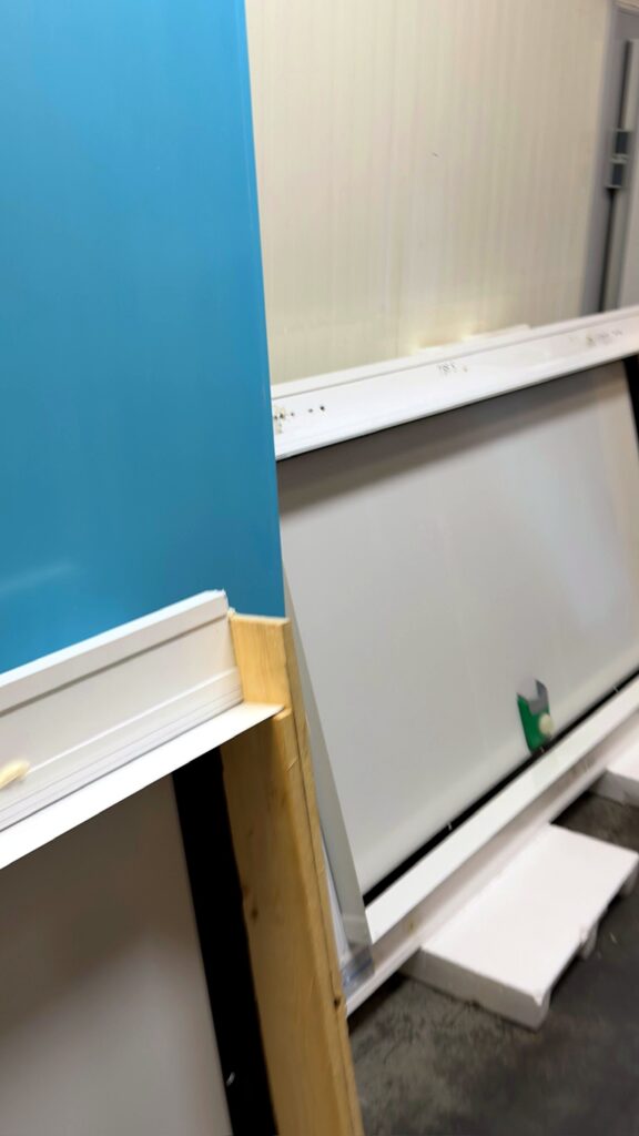 Cold room door frame and panel detail in the workshop
