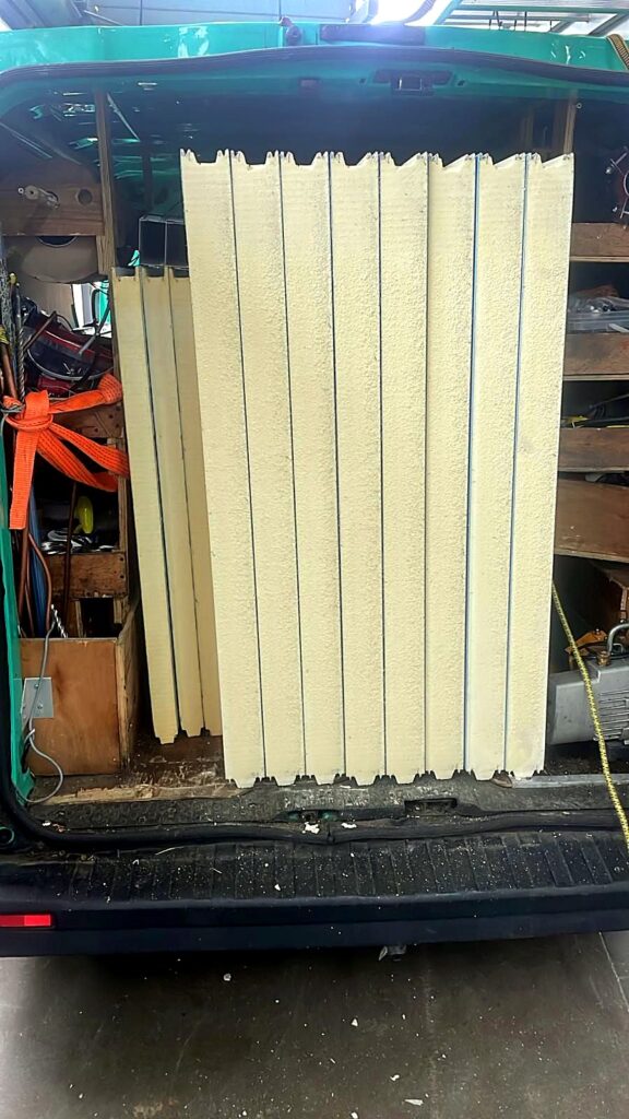 Cold room panels loaded in the van for delivery